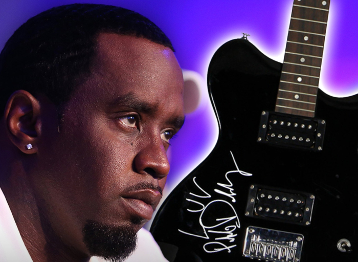 diddy's-puff-daddy-'bad-boy-4-life'-signed-guitar-hits-auction-block