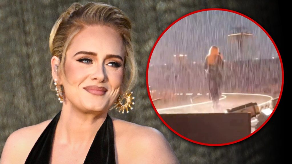 adele-performs-munich-tour-date-in-torrential-downpour