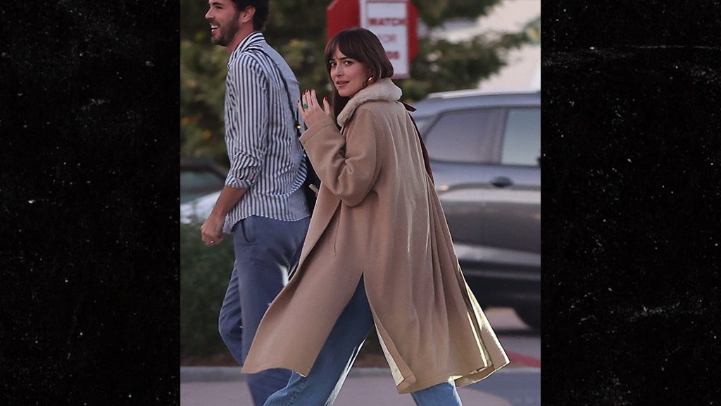 dakota-johnson-flaunts-engagement-ring-after-false-report-of-chris-martin-split