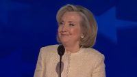 hillary-clinton-smiles-during-‘lock-him-up’-chant-against-trump-at-dnc