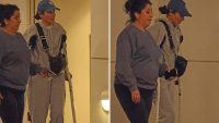 sandra-bullock-hobbles-on-crutches,-going-to-physical-therapy