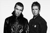 noel-gallagher-does-first-oasis-reunion-interview-explaining-band-split…-with-a-cheeky-little-boy-in-a shop