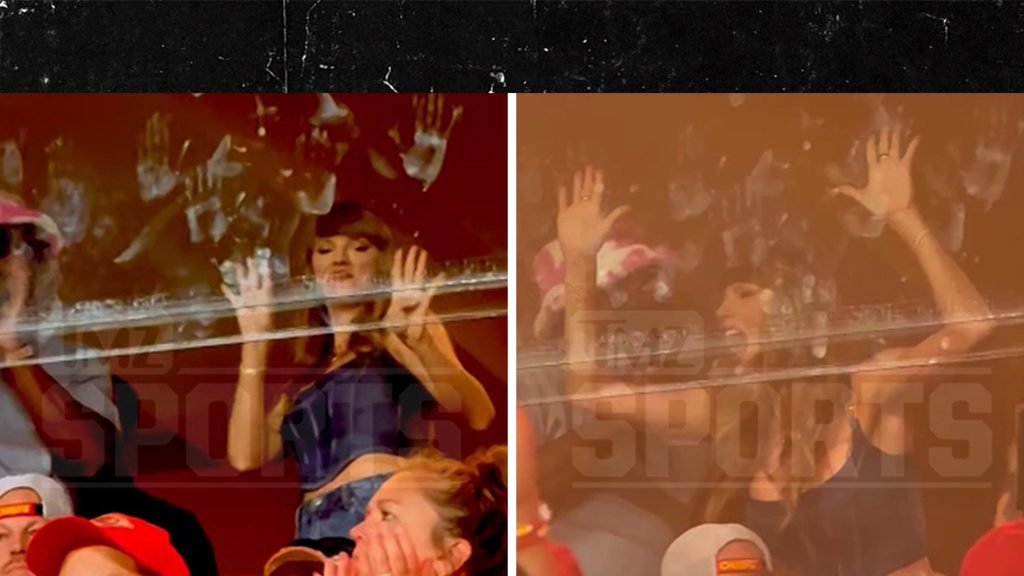 taylor-swift-dances,-bangs-on-glass-during-chiefs-game